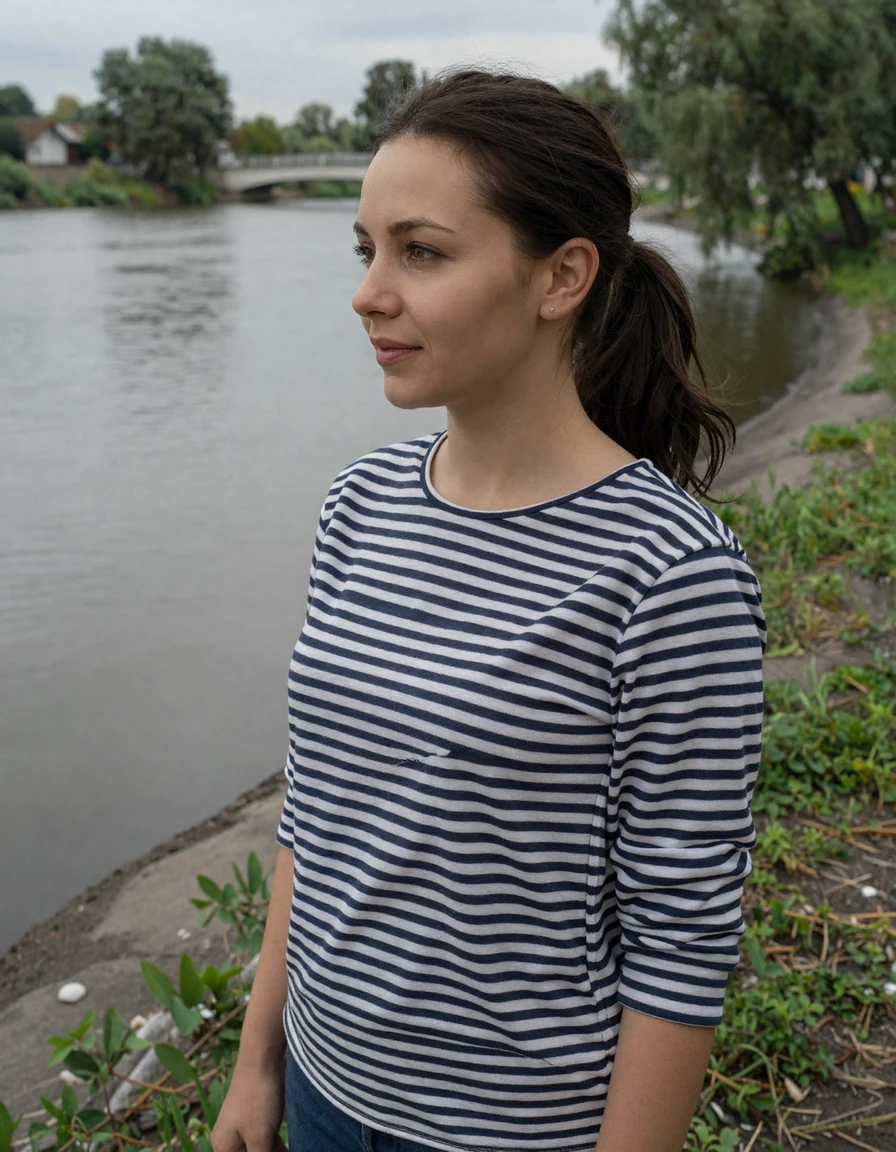 Belarusian woman near a river looking for a partner abroad